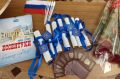 Семеро подростков получили первые паспорта накануне Дня России